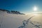 Snow Curonian Spit dunes in January winter sunny day. Blue sky and sea, no people on the beach, calm and beautiful view