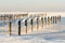 Snow Decorated Alpine Lake Piers