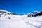 Snow, dolomites and huts