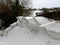 Snow drifts, sculptured, Welsh country lane