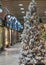 Snow-dusted Christmas tree at lonely cityâ€™s street