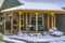 Snow falling on a beautiful home in Daybreak Utah