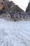 Snow field and start of via ferrata Sentiero Brentari in Brenta Dolomites mountains, Italy