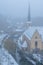 Snow and fog covered Grund, the old part of Luxembourg city HDR