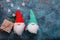 Snow gnomes or elves in a cap. Christmas toy. Blank for a Christmas or New Year card. Copy space