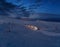 Snow groomers (snowcat ratrack machines) on night predawn excursion ride