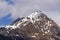 Snow on Hintereggkogel and Ochsenbug Mountain peaks in ski resort Matrei in Osttirol, Austria, sunny