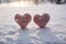 Snow kissed hearts, a romantic gesture in the winter wonderland