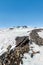 Snow on lava stone on mount etna