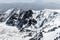 Snow on lava stone on mount etna