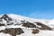 Snow on lava stone on mount etna