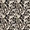Snow leopard or jaguar coat seamless pattern with black rossetes on gray brown background. Exotic wild animal skin print