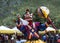 Snow Lion head deity playing drum , Bhutanese Cham Mask dance , Bhutan