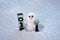 Snow man. Repairman with repair tools. Support repair and recover service. Snowman isolated on snow background.