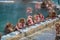 Snow monkeys relaxing in a hot spring pool