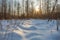 Snow mounds. Erotic snow dunes in the Ukrainian snowy woods evening with soft warm light of sunset Klevan Ukraine.