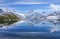 The snow mountain with reflection in lake and clear blue sky in Switzerland