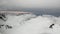 Snow mountain and white clouds view from helicopter in New Zealand.