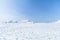 The snow mountains of Tateyama Kurobe alpine with blue sky ba