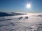 Snow plain on mountain top with sun