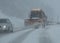 Snow plow on country road