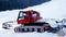 Snow plow truck on ski slope