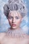 Snow Queen.Fantasy girl portrait. Winter fairy portrait.Young woman with creative silver artistic make-up. Winter Portrait.