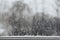 Snow and rain drops on a window, bad weather background with cop