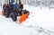 Snow removal machine cleans the street of snow. Cleaning road from snow