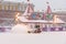 Snow remover cleans the skating rink on Red Square in snowfall in Moscow. Russia