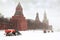 Snow-remover trucks on road near Kremlin