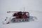 Snow removing machine on mountain slope