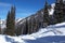 Snow road in winter mountains