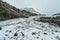 Snow and rock filled mountain pass on the Plain of Six Glaciers Trail