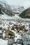 Snow and rock filled mountain pass on the Plain of Six Glaciers Trail