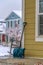 Snow shovel leaning on the wall of a house in Utah