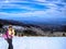 A Snow Skier Enjoys the View From Ski Santa Fe