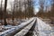 Snow slippery forest road in February