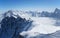 Snow slope with mountain-skiers, the Alps