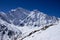 Snow slope with rocks in the background the peak of Seven