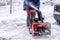 Snow snowblower winter hand man outside clear