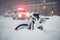 Snow storm in the city. Police car run on emergency call during snow storm in New York City