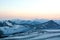 Snow tops of high Mount Elbrus at sunset, mountain landscape, sights and nature