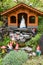 Snow White and Dwarfs on a garden of a house