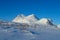 Snow winter in the mountains beyond Northern polar circle