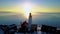 Snow winter weather by the lighthouse of Urk at the lake Ijsselmeer during sunset