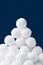 Snowballs heap on dark blue background