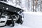 Snowblower at work on a winter day. Removing snow after blizzard snowfall. Clearing the ice. A snow blower is clearing a driveway