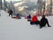 Snowboadrers preparing for a ride. Ski resort Gornaya karusel, 1500 metres, Krasnaya Polyana, Sochi, Russia. January, 2015.