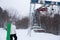 Snowboard skier next to ski lift